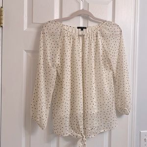 NWOT Cream with black diamond detail tie bottom blouse.